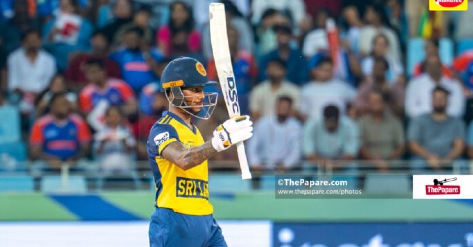 Pathum Nissanka batting for Sri Lanka in a cricket match, full focus and power behind the shot.